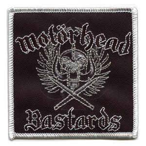 May include: Black and white embroidered patch featuring the text "Motorhead Bastards" and a skull with crossed bones.