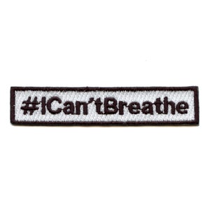 May include: A white embroidered patch with black text that reads "#ICan'tBreathe".
