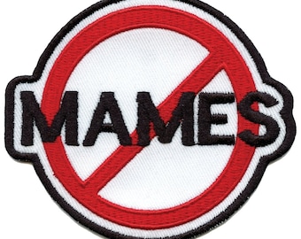 May include: A white embroidered patch with a red circle and a diagonal line through it. The word "MAMES" is written in black letters inside the circle.