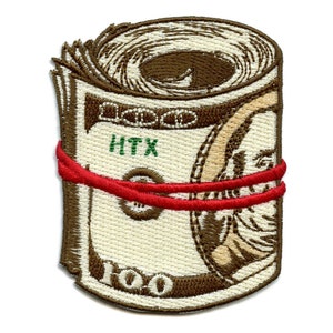 May include: A brown and beige embroidered patch of a rolled-up stack of $100 bills tied with a red band. The patch has the text "HTX" on it.