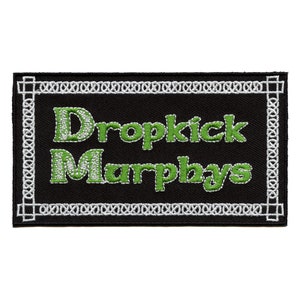 May include: Green and white embroidered patch with the text "Dropkick Murphys" on a black background.