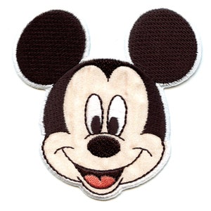 May include: Embroidered patch featuring Mickey Mouse's face with large black ears, white eyes, and a red tongue sticking out.