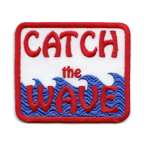 May include: Red and blue embroidered patch with the text "CATCH the WAVE" in white.