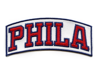 May include: White patch with blue edging, featuring the word "PHILA" in red embroidered letters.