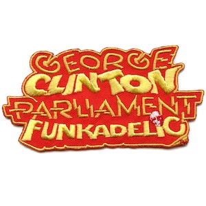 Pode incluir: Um remendo bordado vermelho com o texto "George Clinton Parliament Funkadelic" em letras amarelas.