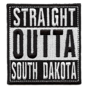 May include: Black and white embroidered patch with the text "STRAIGHT OUTTA SOUTH DAKOTA".