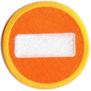 May include: Orange and yellow embroidered patch with a white rectangular shape in the center.