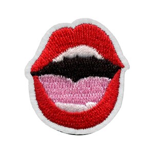 May include: Red embroidered lips with a pink tongue sticking out. The lips are outlined in white.