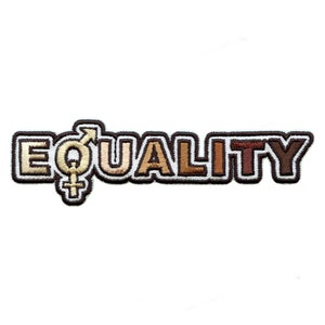 May include: Embroidered patch featuring the word "EQUALITY" in brown, beige, and light brown lettering. The letters are outlined in white. A gender symbol is to the left of the word.