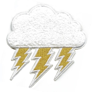 May include: White felt cloud with three gold lightning bolts underneath.