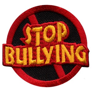 May include: Red and yellow embroidered patch with a red circle and a diagonal red line through it. The words "STOP BULLYING" are in yellow letters.