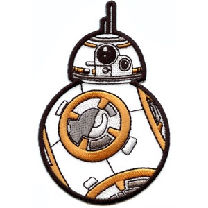 May include: A white and orange cartoon illustration of a droid from the Star Wars franchise. The droid has a round body with a large, circular panel on the front. The panel is surrounded by a gold-colored ring. The droid has a small, black antenna on top of its head.