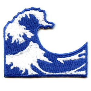 May include: White embroidered wave design on a blue background. The wave is stylized and abstract.