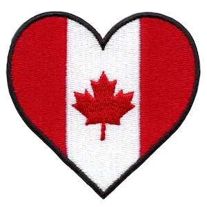 May include: A red and white heart-shaped patch with a red maple leaf in the center. The patch is embroidered with black stitching around the edges.