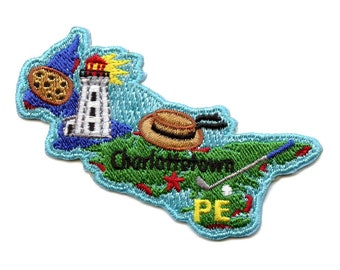 May include: Embroidered patch depicting the outline of Prince Edward Island, Canada. The patch features a lighthouse, a straw hat, a golf club and ball, and the text "Charlottetown, PE".