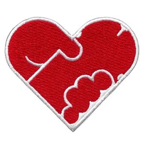 May include: Embroidered red heart patch with a white border. The heart design features a puzzle piece shape, adding a unique touch. Perfect for jackets, bags, or other fabric items.