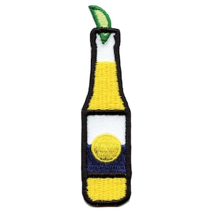 May include: Yellow and white embroidered iron-on patch of a beer bottle with a lime wedge on top. The bottle has a blue and yellow label with a yellow circle.