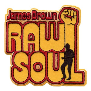 May include: A yellow and red embroidered patch with the text "James Brown Raw Soul" and a silhouette of a person singing. The patch features a raised fist.