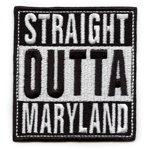 May include: Black and white embroidered patch with the text "STRAIGHT OUTTA MARYLAND".