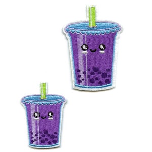 May include: Two purple embroidered iron-on patches of a cartoon boba tea cup with a straw and a smiling face. The cup has white and purple stripes and a white rim with a scalloped edge. The boba tea is filled with black boba pearls.