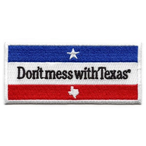 May include: Embroidered patch with a blue, white, and red design resembling the Texas flag. The patch features the text "Don't mess with Texas" and a white star and outline of the state of Texas.
