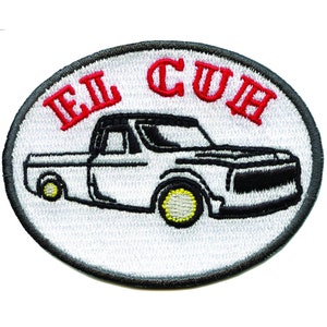 May include: White oval embroidered patch with a black and white illustration of a pickup truck. The text "EL CUH" is embroidered in red above the truck.