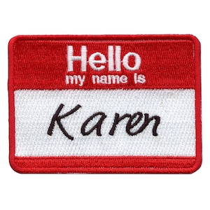 Puede incluir: Una etiqueta de nombre roja y blanca con el texto "Hello my name is Karen" en bordado negro.