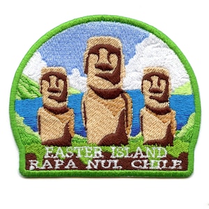May include: Embroidered patch featuring three Moai statues from Easter Island, against a backdrop of blue sky, water, and green grass. The patch has a green border and text that reads "EASTER ISLAND RAPA NUI CHILE."
