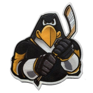 May include: A black and yellow embroidered patch of a cartoon penguin holding a hockey stick. The penguin has a black body, white face, and yellow beak and feet.