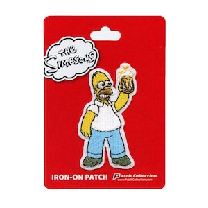 May include: Iron-on patch featuring Homer Simpson from The Simpsons cartoon, holding a beer mug. The patch is on a red card with the words "The Simpsons" and "Iron-on Patch" printed on it.