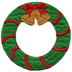 May include: A green and red Christmas wreath with a red bow and two gold bells.