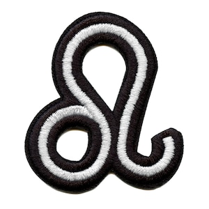 May include: Black and white embroidered iron-on patch of the astrological symbol for Leo.