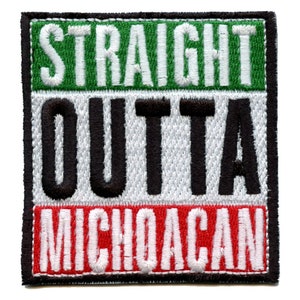 May include: A black and white embroidered patch with the words "Straight Outta Michoacan" in green, black, and red lettering.