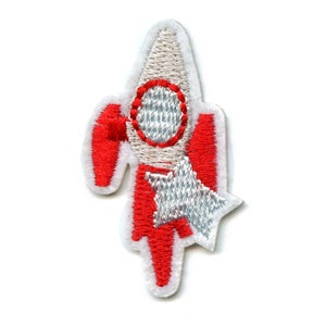 May include: Red and white embroidered rocket patch with a silver star.