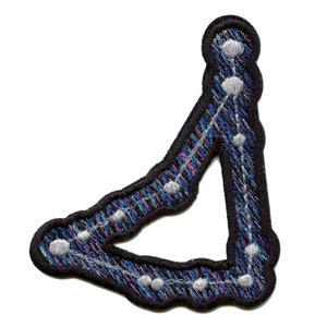 May include: An embroidered patch depicting the constellation Aquarius. The patch is black with a blue, purple, and green plaid pattern. The constellation is outlined in white thread with white beads representing the stars.