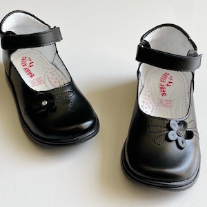 Zapatillas de deporte de lona con correa de lazo uniforme para niñas  pequeñas