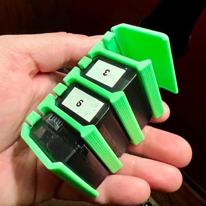 Sony Camera Battery Pack Holder - Holds Four NP-FW50 Batteries