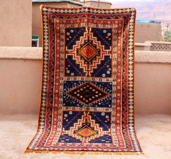 Handwoven Treasure: Antique Moroccan Rug 6x10 ft - Berber Artistry-Tribal Picasso Design
