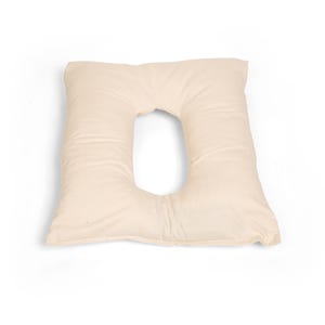 a pillow that is shaped like the letter o