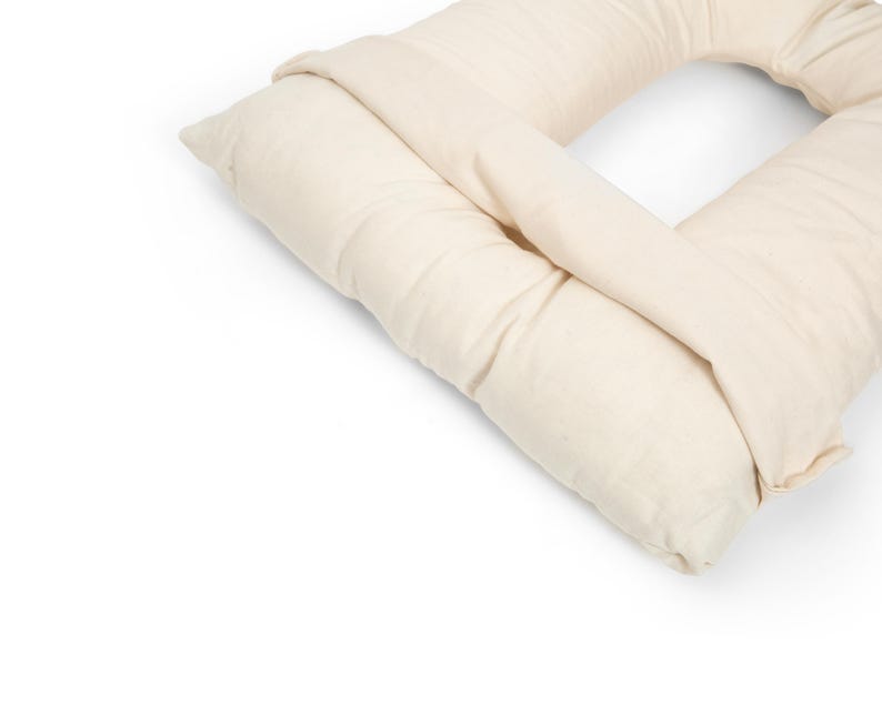 a pillow that is shaped like a rectangle