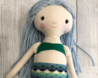 stuffed dolls with yarn hair