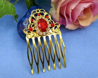 Small glamorous royal hair comb with red and clear resin crystals