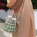 see more listings in the Raffia crossbody bag section