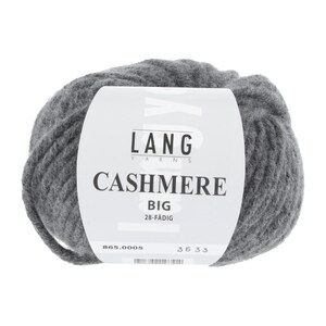 May include: A large ball of grey Lang Cashmere Big yarn. The yarn is wrapped around a white label with the brand name and product details. The label includes the text "CASHMERE BIG 28-FÄDIG".