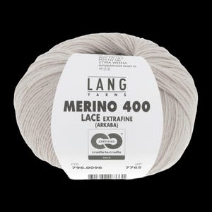 May include: A ball of pale grey Lang Yarns Merino 400 Lace Extrafine yarn. The label shows the brand name, yarn type, and certifications. The yarn is a soft, natural fibre, suitable for knitting or crocheting fine items.