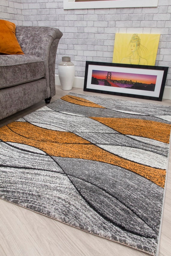 Orange and on sale grey rug