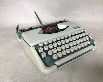 Olympia Splendid 66 5-1157750 vintage portable typewriter, working, renovated, elite font, gift for writers
