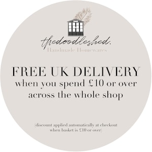 May include: A white circle with a gray background and black text. The text reads "thedoodleshed. Handmade Homewares FREE UK DELIVERY when you spend &pound;10 or over across the whole shop (discount applied automatically at checkout when basket is &pound;10 or over)"