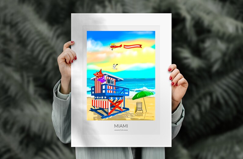 May include: A colorful illustration of a Miami beach scene. A lifeguard stand with red and white stripes and blue accents stands on a sandy beach. A biplane flies in the sky above the ocean. The word "MIAMI" is at the bottom.