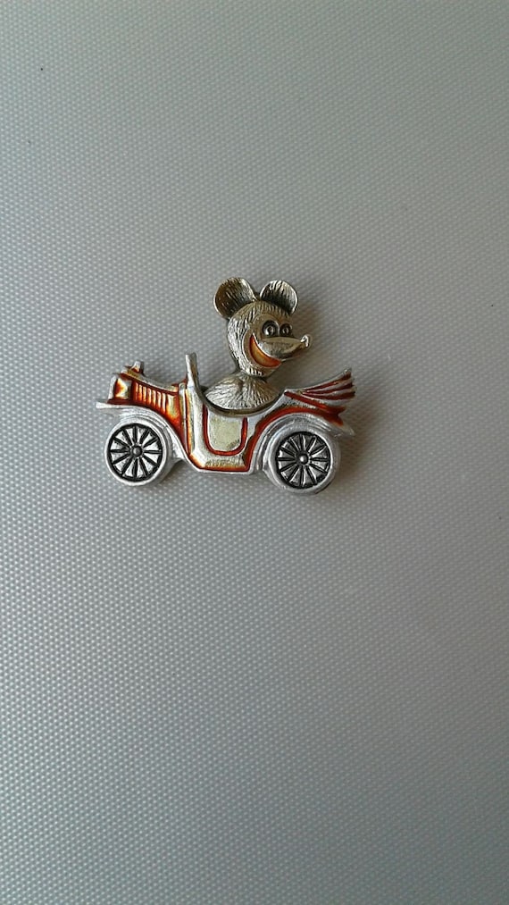 Teddy bear. Icon. Teddy bear on a car. Soviet old